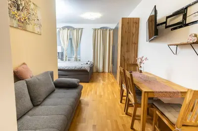 Ein Sitzbereich in der Unterkunft Deluxe Living