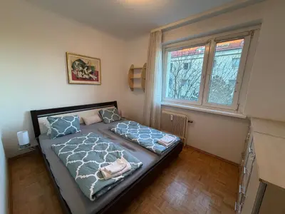 Ein Bett oder Betten in einem Zimmer der Unterkunft Wiener Wohlgefühl