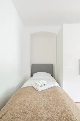 Ein Bett oder Betten in einem Zimmer der Unterkunft COY Apartments Purkersdorf - Garden Comfort for Work Family near Vienna