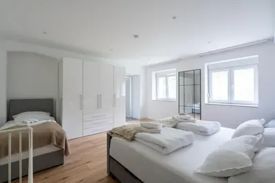 Ein Bett oder Betten in einem Zimmer der Unterkunft COY Apartments Purkersdorf - Garden Comfort for Work Family near Vienna