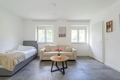 Ein Bett oder Betten in einem Zimmer der Unterkunft COY Apartments Purkersdorf - Garden Comfort for Work Family near Vienna