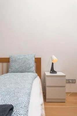 Ein Bett oder Betten in einem Zimmer der Unterkunft Austrian Vintage Apartments in Landstraße Wien Mitte