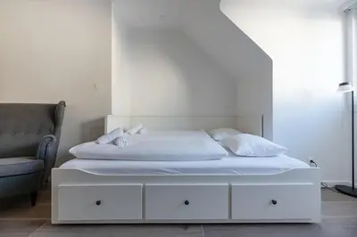Ein Bett oder Betten in einem Zimmer der Unterkunft Vor den Toren Wiens in Ruhelage