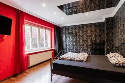 Ein Bett oder Betten in einem Zimmer der Unterkunft Ferienhaus mit Disco, Whirlpool und vielem mehr