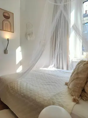 Ein Bett oder Betten in einem Zimmer der Unterkunft Cozy small apartment