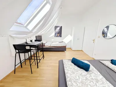 Ein Bett oder Betten in einem Zimmer der Unterkunft Lovely Rooms in Märzstraße Area MZ49