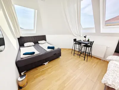 Ein Bett oder Betten in einem Zimmer der Unterkunft Lovely Rooms in Märzstraße Area MZ49