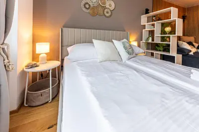 Ein Bett oder Betten in einem Zimmer der Unterkunft Boho Vienna by JR City Apartments - Main station, Belvedere, City Center
