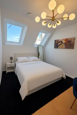 Ein Bett oder Betten in einem Zimmer der Unterkunft Vienna Royal Penthouse