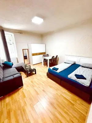 Ein Bett oder Betten in einem Zimmer der Unterkunft Lovely Rooms in Märzstraße Area MZ10