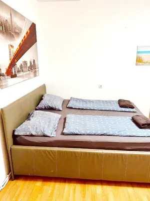 Ein Bett oder Betten in einem Zimmer der Unterkunft Lovely Rooms in Märzstraße Area MZ10