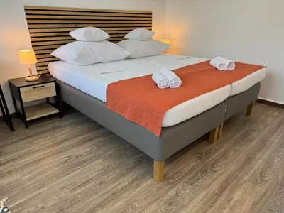 Ein Bett oder Betten in einem Zimmer der Unterkunft Stylish and Comfortable - Your Apartment