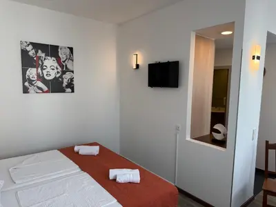 Ein Bett oder Betten in einem Zimmer der Unterkunft Stylish and Comfortable - Your Apartment