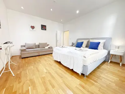 Ein Bett oder Betten in einem Zimmer der Unterkunft 3 Bedrooms, near Hauptbahnhof, 8 People, Kitchen