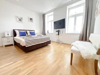 Ein Bett oder Betten in einem Zimmer der Unterkunft 3 Bedrooms, near Hauptbahnhof, 8 People, Kitchen