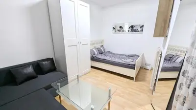 Ein Bett oder Betten in einem Zimmer der Unterkunft Cozy rooms in Stadthalle Area HB