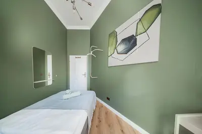 Ein Bett oder Betten in einem Zimmer der Unterkunft HOME1 - Jardin Boutique Hostel
