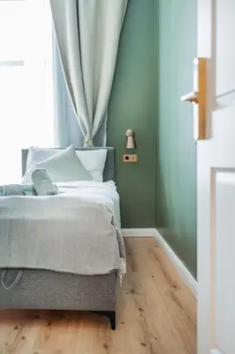 Ein Bett oder Betten in einem Zimmer der Unterkunft HOME1 - Jardin Boutique Hostel