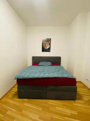 Ein Bett oder Betten in einem Zimmer der Unterkunft ApartSiebenbrunneng4
