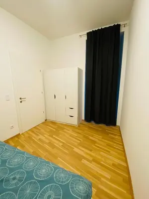 Ein Bett oder Betten in einem Zimmer der Unterkunft ApartSiebenbrunneng4