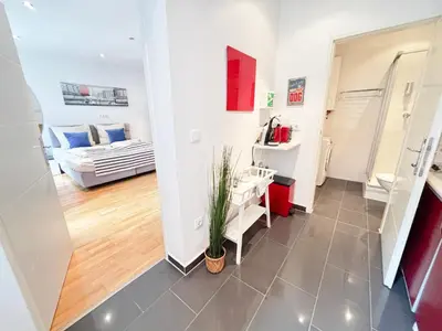 Ein Bett oder Betten in einem Zimmer der Unterkunft Studio King Bed & Kitchen - near Prater, no Elevator 4th Floor
