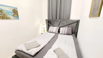 Ein Bett oder Betten in einem Zimmer der Unterkunft Comfortable rooms in Lugner City area HE