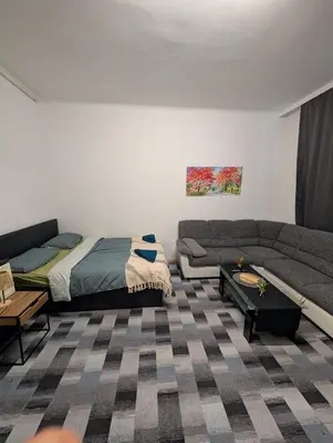 Ein Bett oder Betten in einem Zimmer der Unterkunft Cozy Apartment in Simmering
