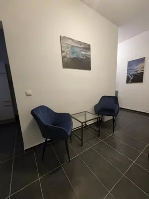 Ein Sitzbereich in der Unterkunft Sapphire Suite