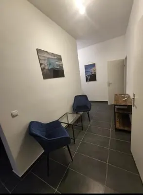 Ein Sitzbereich in der Unterkunft Sapphire Suite