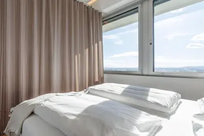 Ein Bett oder Betten in einem Zimmer der Unterkunft Vienna Skyline Apartment