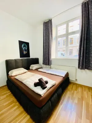 Ein Bett oder Betten in einem Zimmer der Unterkunft Family Apartment near Schönbrunn Palace HL3