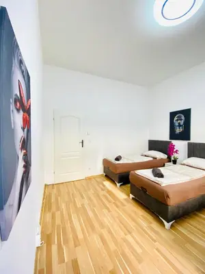 Ein Bett oder Betten in einem Zimmer der Unterkunft Family Apartment near Schönbrunn Palace HL3
