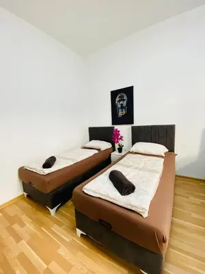 Ein Bett oder Betten in einem Zimmer der Unterkunft Family Apartment near Schönbrunn Palace HL3