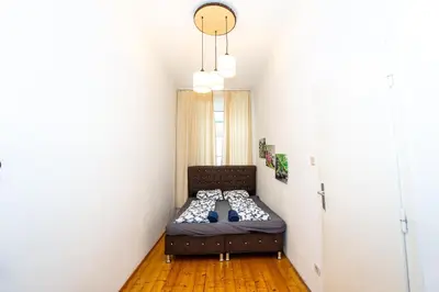 Ein Bett oder Betten in einem Zimmer der Unterkunft Family Apartment near Schönbrunn Palace HL18