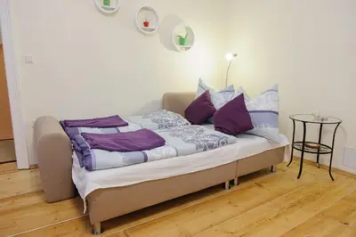 Ein Bett oder Betten in einem Zimmer der Unterkunft Cozy City Apartments Augarten
