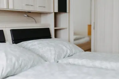 Ein Bett oder Betten in einem Zimmer der Unterkunft Ferienwohnung Parndorf