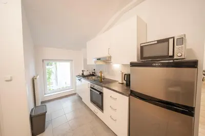Küche/Küchenzeile in der Unterkunft 2 Bedroom Apartments, 18 Min to city center, Kitchen, Smart TV