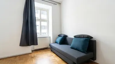 Ein Sitzbereich in der Unterkunft Stylish 1BR City Apartment for 5, Great Location