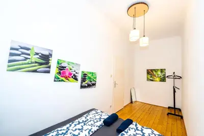 Ein Bett oder Betten in einem Zimmer der Unterkunft Family Rooms - 7 Minutes to Schönbrunn Palace