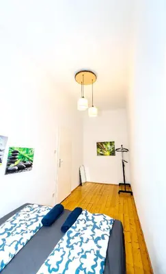 Ein Bett oder Betten in einem Zimmer der Unterkunft Family Rooms - 7 Minutes to Schönbrunn Palace