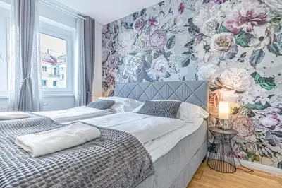 Ein Bett oder Betten in einem Zimmer der Unterkunft Stylish 1BR Apartment near Favoritenstrasse Central and Cozy