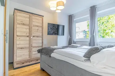 Ein Bett oder Betten in einem Zimmer der Unterkunft Stylish 1BR Apartment near Favoritenstrasse Central and Cozy