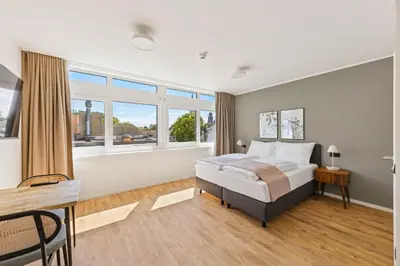 Ein Bett oder Betten in einem Zimmer der Unterkunft Limehome Vienna Hietzinger Hauptstraße