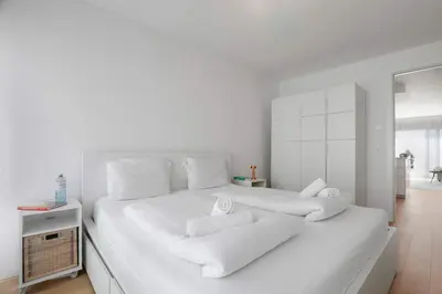 Ein Bett oder Betten in einem Zimmer der Unterkunft Superior Cityline Suite