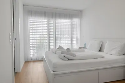 Ein Bett oder Betten in einem Zimmer der Unterkunft Superior Cityline Suite