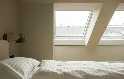 Ein Bett oder Betten in einem Zimmer der Unterkunft HeyMi Apartments Brick Lane Vienna