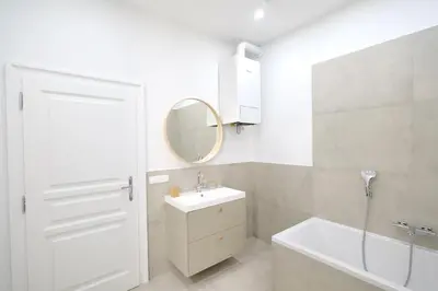 Ein Badezimmer in der Unterkunft Toplage beim Rathaus Grace Family City Apartment