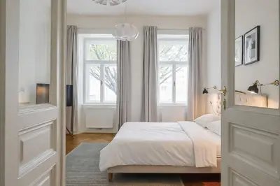 Ein Bett oder Betten in einem Zimmer der Unterkunft HeyMi Apartments Stolberggasse