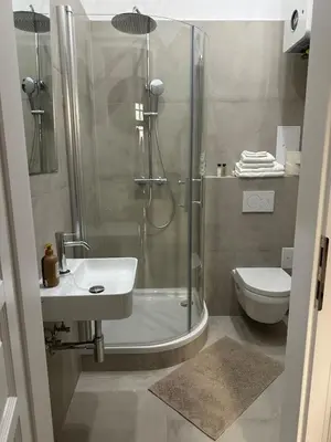 Ein Badezimmer in der Unterkunft Toplage beim Rathaus Grace Royal Designsuite