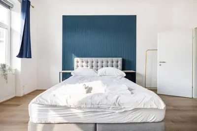 Ein Bett oder Betten in einem Zimmer der Unterkunft 21aaa22